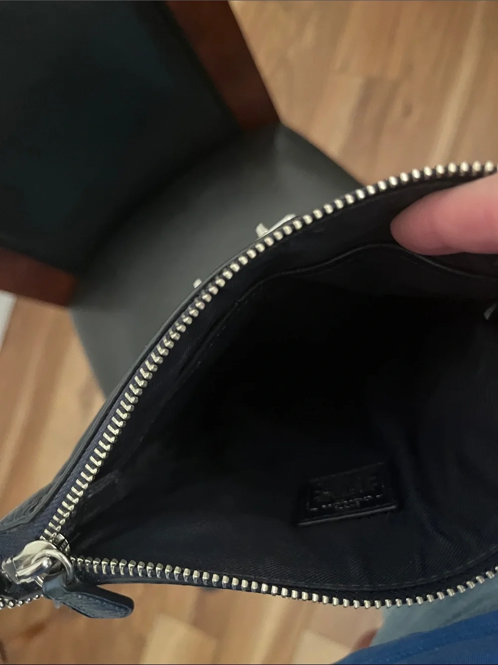 Metallic blue Coach crossbody purse